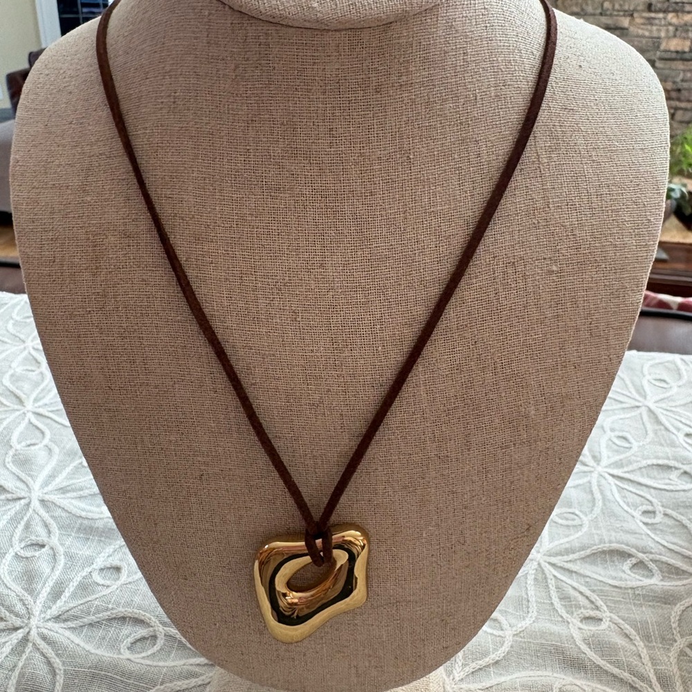 Elegant Gold Sculpture Long Pendant Necklace on Brown Cord - Picture 2 of 9